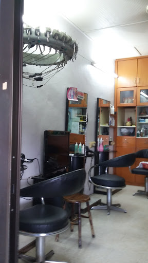 B. Bee Unisex Hair Saloon B. Bee Unisex Hair Saloon